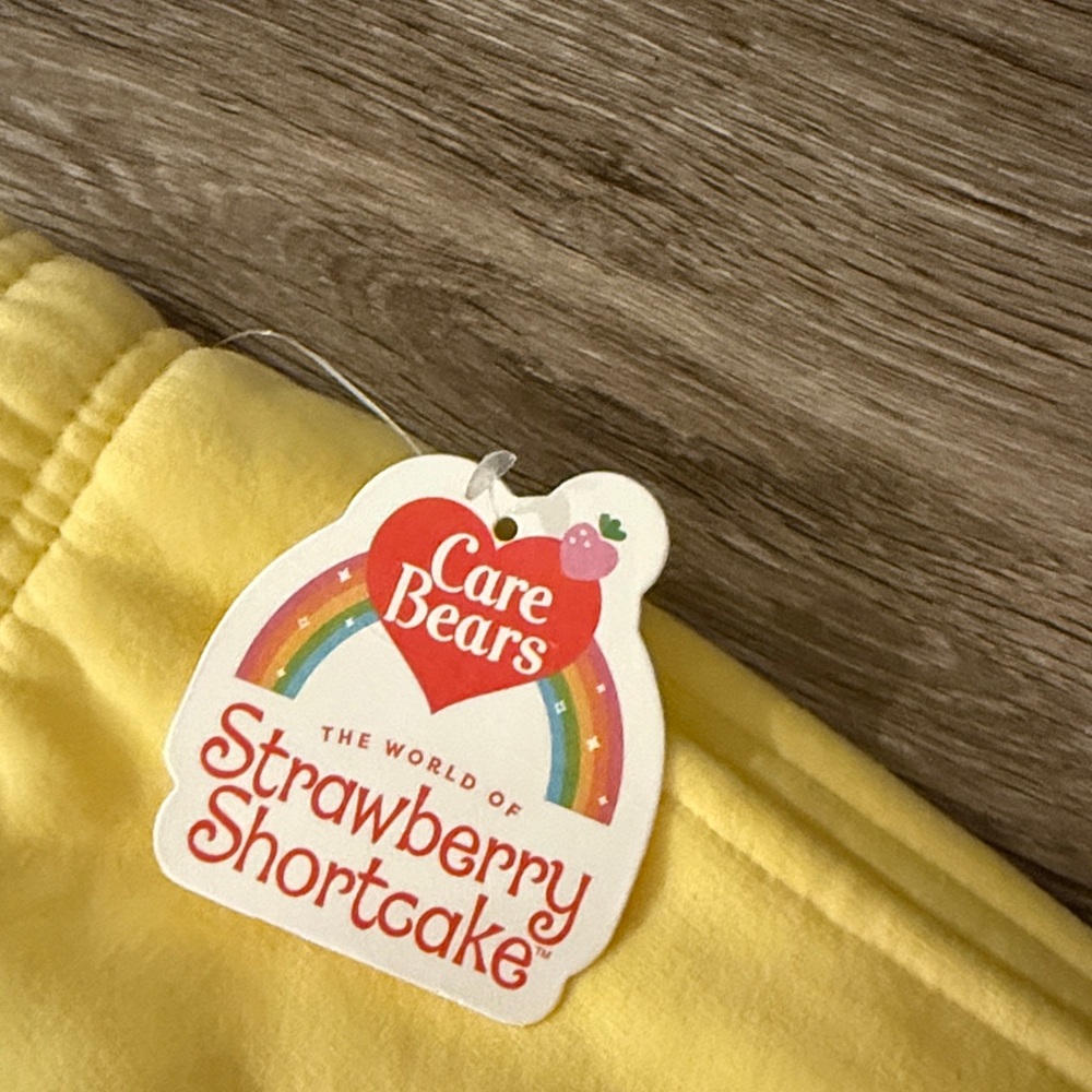 NWT L Samii Ryan Care Bears & Strawberry Shortcake Offer Kindness Yellow Joggers - Picture 8 of 10